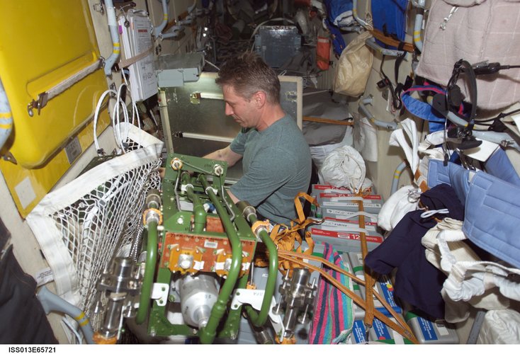 Thomas Reiter carries out a maintenance task in the Zarya module