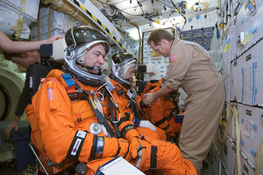 Astronauts Paolo Nespoli, STS-120 mission specialist, Daniel M. Tani, Expedition 15 flight engineer; and Scott E. Parazynski