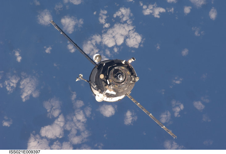 An unpiloted Progress spacecraft approaches the ISS for docking