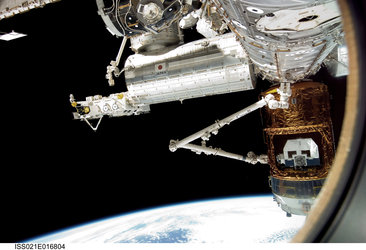 Canadarm2 grapples the Japanese H-II Transfer Vehicle in preparation for its release